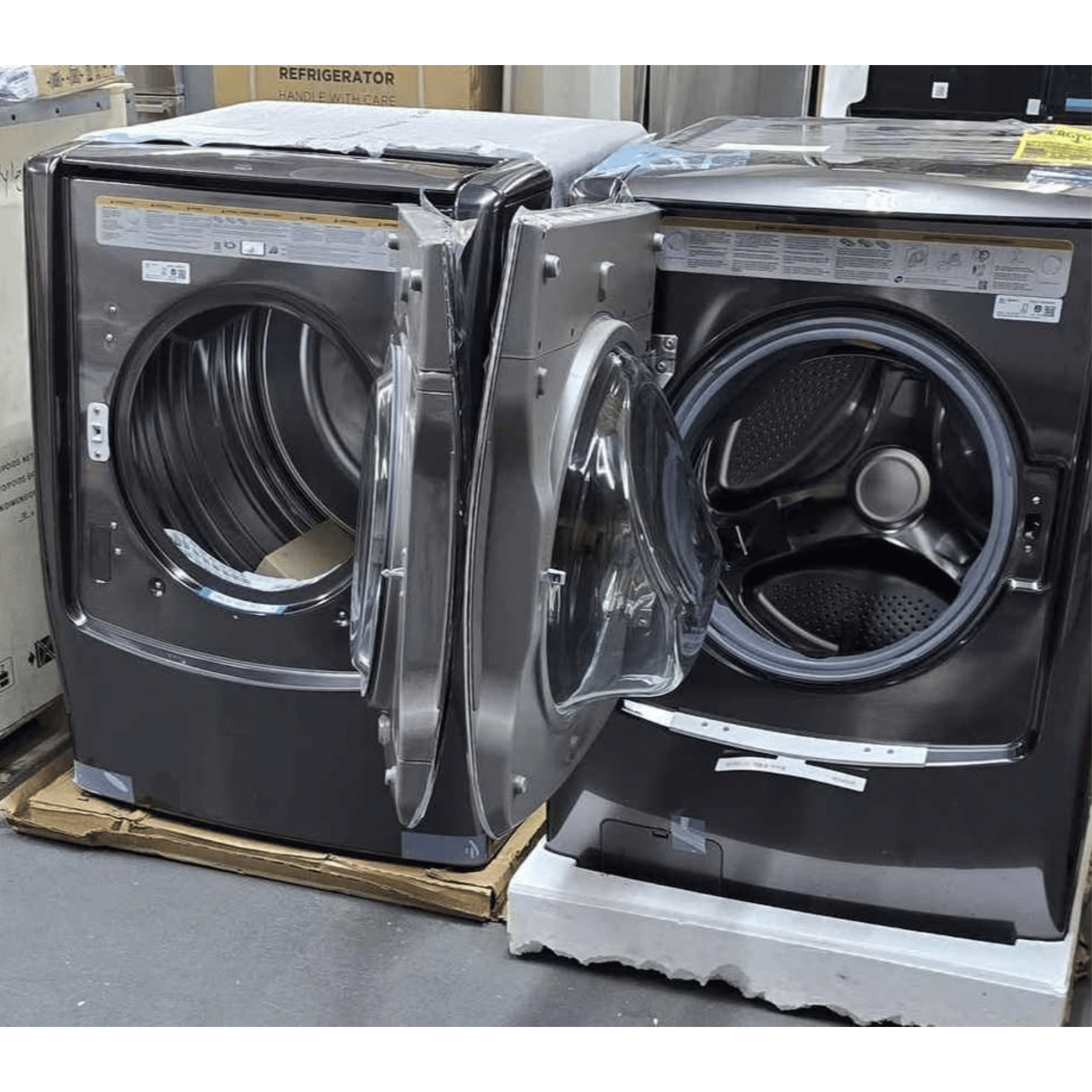 LG Signature WM9500HKA and DLEX9500K mega front load washer dryer set, black stainless