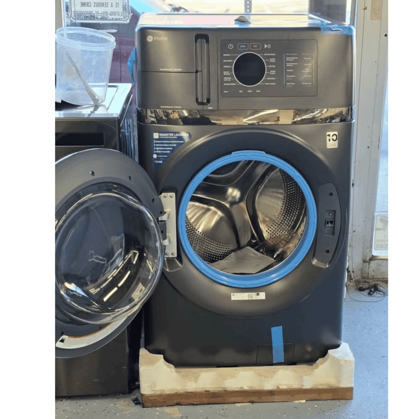 GE Profile ventless washer dryer combo door open showing drum
